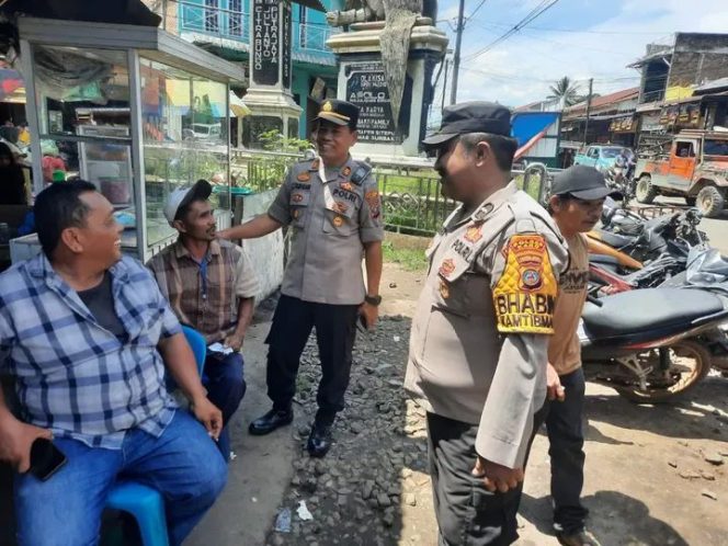 
					Polsek Tigabinanga Gencarkan Sapa Warga, Perkuat Cooling System di Pusat Pasar